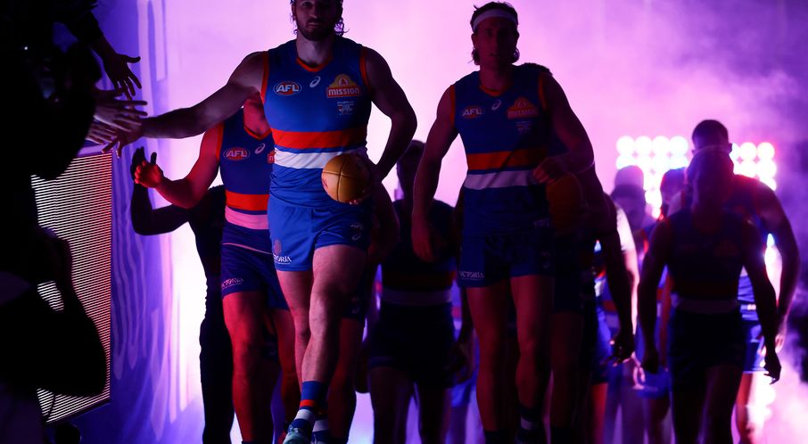 The Western Bulldogs walk out onto the ground